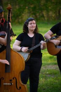 Hannah playing banjo