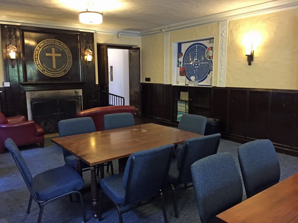 Picture of tables and chairs in the Fireside room